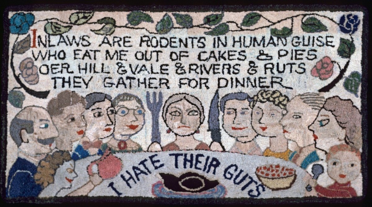 Rug that says "Inlaws are rodents in human guise, who eat me out of cakes and pies. Oer hill & vale & rivers & ruts they gather for dinner. I hate their guts."